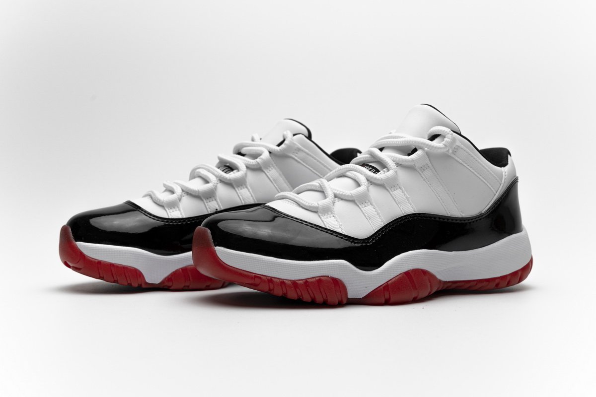 AV2187-160 Air Jordan 11 Low “White Bred”